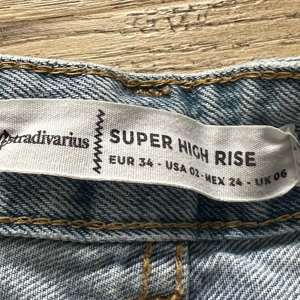 Stradivarius Light Blue‎ Distressed Jean Shorts with Red Accents
